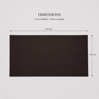 A dark brown rectangular mat or rug shown on a light gray background with dimension labels above it reading 210 cm width and 100 cm length.